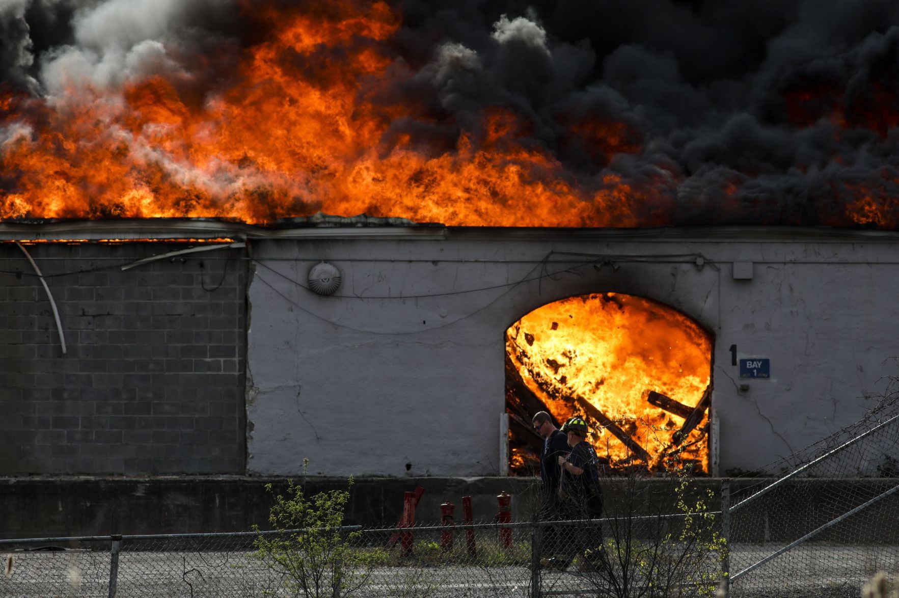 Large fire rolls through warehouse